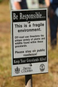 Signs along the trail remind users that the wilderness is a fragile place and to keep vehicles from venturing off the trail. 