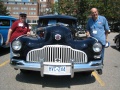Wes and Lois Ebbs with their 1942 McLaughlin-Buick, called a blackout because the painted trim wouldn\'t reflect lights during a war air raid