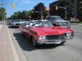 The 1960s Buicks parade down Oshawa\'s main street en route to Parkwood