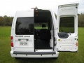 2010 Ford Transit Connect. The rear doors can be opened 180 degrees.