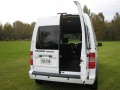 2010 Ford Transit Connect.  The rear doors first open straight out.