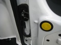 2010 Ford Transit Connect. Hitting the yellow button disconnects the hinge to open the doors 180 degrees. 