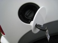 2010 Ford Transit Connect. the gas filler door opens with the ignition key.