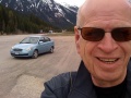 The author and 2006 Hyundai Accent in Rogers Pass, British Columbia