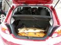 2014 Mitsubishi Mirage cargo area with 20" pike on a board