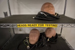 Dummy heads are used to test headliners 