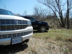 Lincoln Navigator (left) and Cadillac Escalade