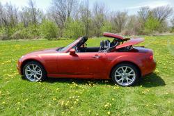 2014 Mazda MX-5 GT with roof partially stowed