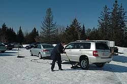 Ben Lalonde of Commercial Tire in Ottawa changes tires on the Toyota Highlander