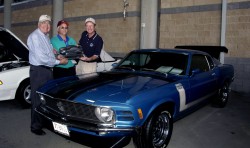 Lebanon, Tenn. -- Mustang legend Carroll Shelby (L) and Ford Division President Steve Lyons (R) present "Ford's Choice Award" to David Reynolds, of Blacksburg, VA., and his 1970 BOSS Mustang.