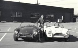 Cobra publicity, Venice, CA, 1964.
Carroll Shelby poses with his new 1964 production Cobra and his new Cobra race car.
CD#0777-3292-0895-14.