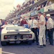 24 Hours of LeMans, LeMans, France, 1965.
Carroll Shelby stands at the rear of the Ford Mark II prototype that Phil Hill and Chris Amon drove.
CD#0777-3292-0630-15.